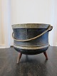 Pot made of cast iron
An antique pot, made of cast iron and with 3 legs 
and a holder
About 1870
H: 36,5cm, Diam: 41cm