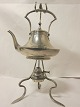 Tea pot with rack and burner
Very decorative 
H total: 48cm
H tee pot : 25cm
B tee pot: 27cm
