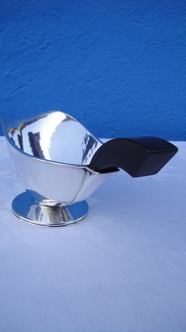 Silver sauce jug, Sold