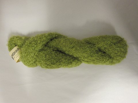 Mohair Bouclé
Mohair Bouclé is a natural product of a very high quality from the angora goat 
from South Africa.
The colour shown is: Lime, Colourno 1099
1 ball of wool containing 100 grams