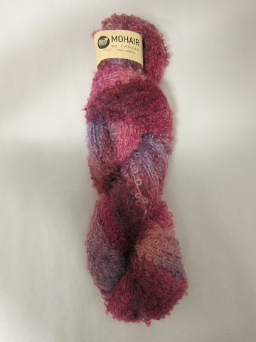 Mohair Bouclé Mix
Mohair Bouclé Mixer et naturprodukt fra sydafrikanske angorageder.
Den viste farve er: Skovbær Mix, Farvenr. 1072
Prisen er pr. nøgle med 100 gram Mohair Bouclé Mix