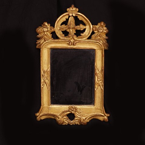 A small gilt Louis XVI mirror. Denmark circa 1780. 
55x34cm