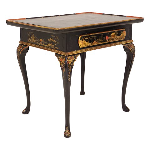 A black laquered Rococo slate top table. Denmark 
circa 1760. Slate top later. H: 75cm. Top: 87x61cm