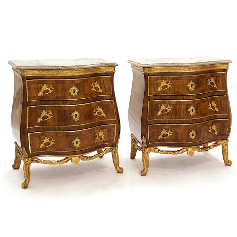 Pair of Danish mid 18th century partly gilt walnut 
chest of drawers. Denmark circa 1750. H: 78cm. W: 
67cm. D: 44cm