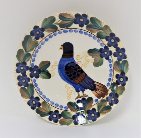 Aluminum. Faience Plate with bird. Model 774-404. Diameter 20 cm.