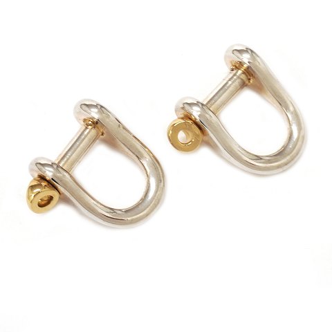 Ole Lynggard Sterlingsilver and 18kt gold 
cufflinks. Size: 2,4x2,4cm