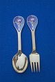Set 1999  Christmas spoon and fork of gilt 
sterling silver