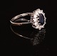 Jørgen Rasmussen, Copenhagen: Ring of 14ct Whitegold gold with sapphire and 12 
diamonds. 0,84ct. Ringsize: 54-55