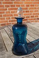 Holmegaard cluck cluck bottle of dark-blue glass with cork