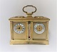 English travel clock with weather station. There are clock, barometer, compass 
and thermometer. Length 16.5 cm. Clockwork works. Winding key included.