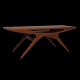 Johannes Andersen, Denmark: "The Smile" teak table. H: 49cm. Top: 52x135cm