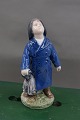 Royal Copenhagen porcelænsfigur nr. 3556, Dreng i 
regnfrakke med paraply
