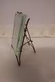 Photo frame, antique
This frame is made of thick glass with a stand 
made of brass which can be folded up
About the beginning of the 1900-years
About 12cm x 8,5cm/10cm
In a good condition
We have a large choice