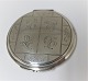 Georg Jensen. Silver powder can. Sterling (925). Model 231. Diameter 6.7 cm. 
Produced 1933 - 1945. Design Harald Nielsen.