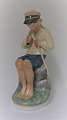 Royal Copenhagen. Porcelain figurine. Slicing boy. Model 905. Height 18 cm. (1 
quality).