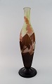 L'Art presents: 
Colossal 
antique Emile 
Gallé "Ricin" 
vase in frosted 
art glass with 
light brown and 
delicate ...