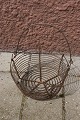 Basket with handle in steel wire. Swedish tramp work