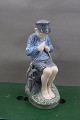 Royal Copenhagen porcelain figurine No 905, Boy cutting stick. 