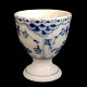 Royal Copenhagen, blue fluted half lace; An egg cup of ...