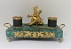 Ink house with base of malachite, and gilded soldier. Length 28 cm. Width 14 cm. 
Height 14 cm. Probably Russian.