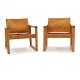Ein Paar "DIANA" Lounge Stühle mit patiniertem cognacfarbenen Leder. Design von 
Karin Möbring für IKEA 1977. H: 70cm. B: 63cm. T: 63cm