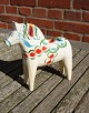 Cream-colored Dala horses from Sweden H 16.5cms