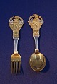 Michelsen set Christmas spoon and fork 1924 of 
Danish gilt silver