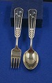 Michelsen set Christmas spoon and fork 1937 of 
Danish gilt sterling silver