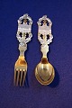 Michelsen set Christmas spoon and fork 1926 of 
Danish gilt sterling silver