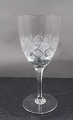 Vienna Antique glassware with straight, faceted 
stem by Lyngby Glass-Works, Denmark. Red wine 
glasses 16.5cm