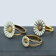 Georg Jensen; 
Daisy rings of 
gilted sterling 
silver with ...