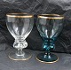 Gisselfeld with gold rim. White wine glasses, 
green and clear, 11cm