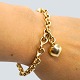Antik 
Damgaard-
Lauritsen 
presents: 
Ole 
Lynggaard; 
Bracelet of 14k 
gold, with 
heart charm and 
'Smilet' clasp