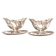 Pair silver sauce boats by A. Michelsen, Copenhagen, dated 1898 & 1901. H: 13cm. 
L: 22cm. W: 1.244gr