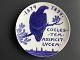 Ole Buus Larsen 
præsenterer: 
Kongelig 
porcelæns 
mindeplatte 
1899 - 25 års 
Studenterjubilæum.
