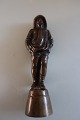 Eine alte 
Figur, 
vielleicht ein 
Fischer, aus 
Messing
H: ...