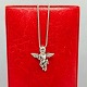 Antik 
Damgaard-
Lauritsen 
presents: 
A necklace 
in 14k white 
gold set with a 
diamond angel