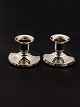 A pair of small 
830 silver 
candlesticks