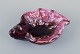 L'Art presents: 
Vallauris, 
France, 
snail-shaped 
stoneware bowl 
with glaze in 
shades of pink 
and brown.