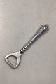 Danam Antik 
presents: 
Cohr 
Herregaard 
Silver Bottle 
Opener