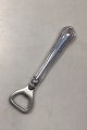 Danam Antik 
presents: 
Cohr 
Herregaard 
Silver Bottle 
Opener