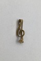 Danam Antik 
presents: 
Georg 
Jensen 18K Gold 
Brooch Clef
