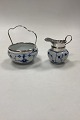 Danam Antik 
presents: 
German 
blue-fluted 
Sugar and Cream 
set