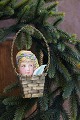 Old Christmas 
tree ornament 
in the shape of 
a small ...