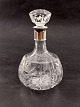 Crystal carafe 
with silver 
mounting