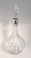 Karaffe mit 
Silbermontierung 
(830). Höhe 34 
cm. ...