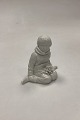 Danam Antik 
presents: 
Royal 
Copenhagen 
Blanc de Chine 
Figurine - Boy 
with Flowers 
from Greenland 
No. 12419