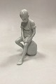 Danam Antik 
presents: 
Royal 
Copenhagen 
Blanc de Chine 
Figurine - Boy 
on Stone No. 
520