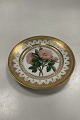 Danam Antik presents: Royal Copenhagen Antique Plate with Flower Motif and gold. Signed by Christian Klein from ...