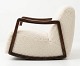 Lundin Antique präsentiert: Seltenes Schaukelsofa von Bienal, Modell Gyngen. Bezug aus neuer Lammwolle. Gestell ...